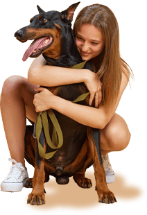 A happy woman hugging her Doberman Pinscher, an image inviting users to sign up for caring news and pet care tips from **SmartPawz**.