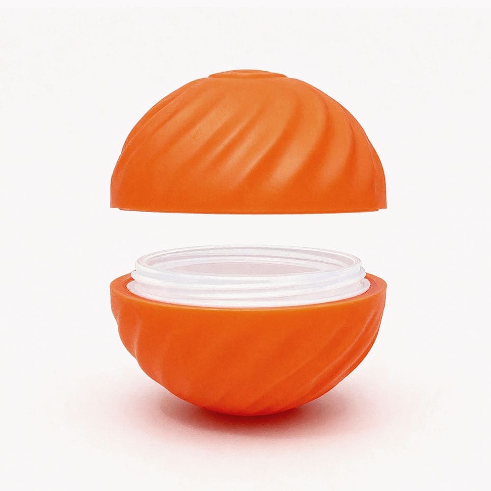 The SmartPawz PawMinder interactive toy disassembled, showing the core and the outer shell, which can be easily replaced.