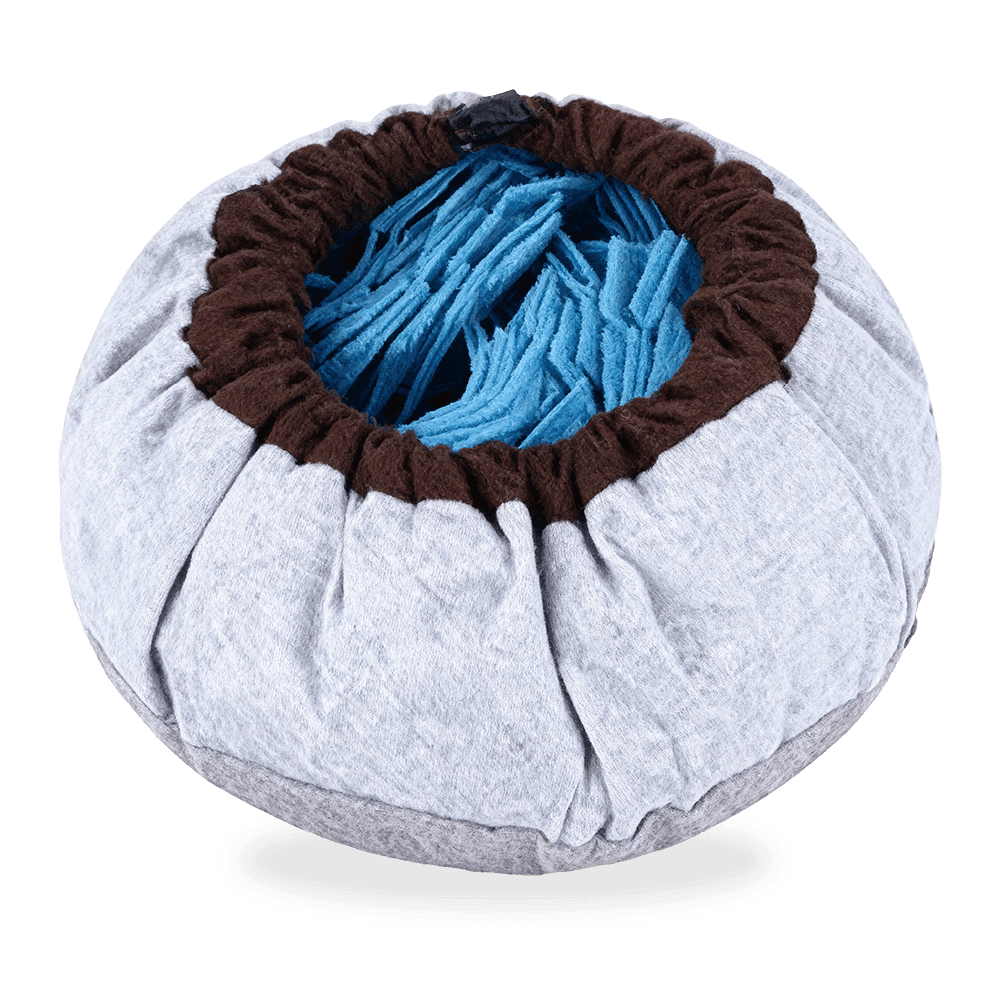 The SmartPawz round snuffle mat with a light-colored outer layer and a dark trim, cinched into a bowl shape for engaging playtime.